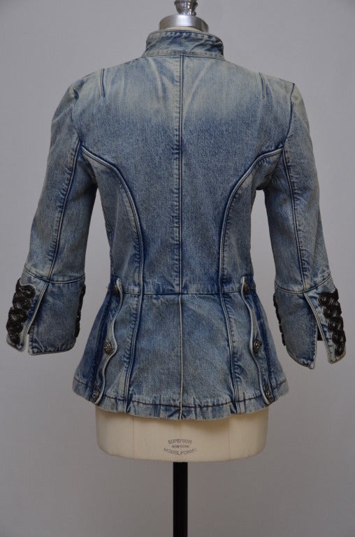 Balmain military denim jacket.From S/S '09.
Excellent gently worn condition.Seen on many celebrities and fashion magazine covers.Size 46Fr.This jacket run small.Sizing in US is more like 6/8.All buttons in place.No damage to chain