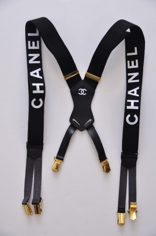 Chanel black suspenders with white CHANEL print.Excellent new condition.
Made in France.
Final sale.