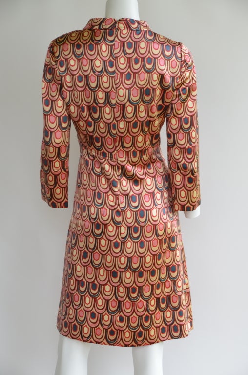 EMILIO PUCCI  FAMOUS PEACOCK PRINT DRESS.SAME EMILIO PUCCI PEACOCK PRINT   WORN BY MARILYN MONROE.
DRESS CONDITION IS  EXCELLENT.COLORS ARE VIBRANT.
SIZE 44 IT OR  SIZE 6/8 US.SLEEVES ARE 3/4 LENGHT.
2 POCKETS ON THE FRONT.ZIPPER CLOSURE ON THE