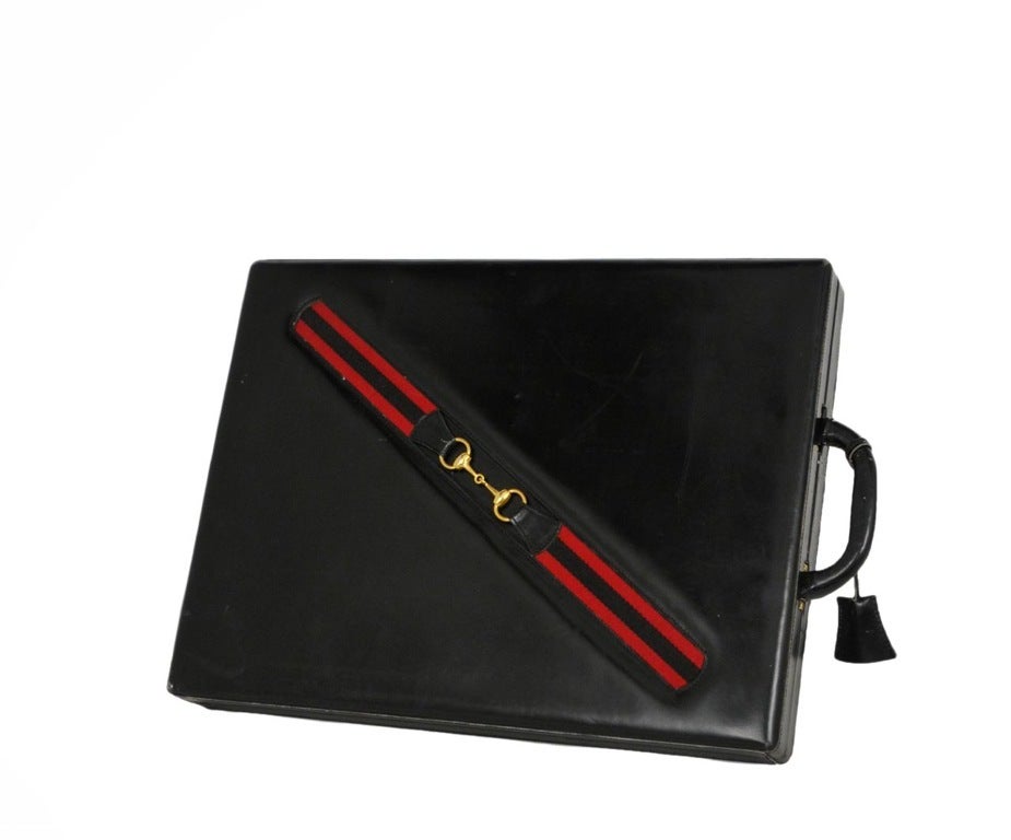 Gucci backgammon set in a black leather case. All pieces original and in tact.