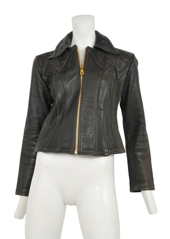 East West Musical Instrument Company was a leather company that emerged from the 60's movement in San Francisco from 1967 - 1972. We are offering a rare piece in 
black leather. A fitted motorcycle jacket with top stitched shoulder appliques.