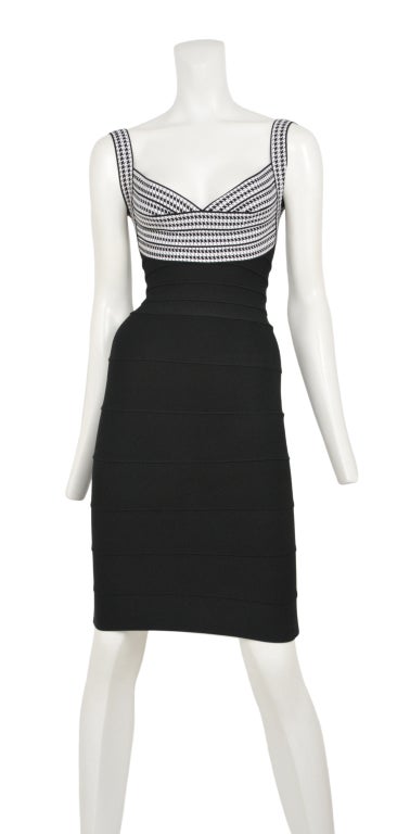 Early Herve Leger bandage dress with houndstooth print at bust. Zip back closure.