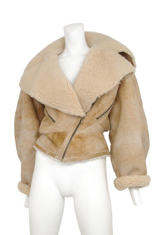 Oversized shearling cropped motorcycle coat with wide collar.