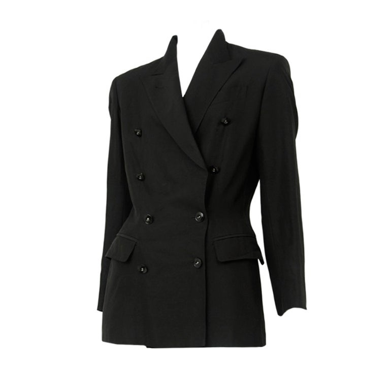 Early Gaultier double breast blazer with sharp constructed shoulders. Large cut outs at back with buckle closures.