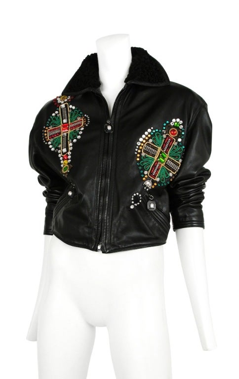 Gianni Versace Iconic embellished leather bomber from Fall 91-92. Zip pockets and sleeves with mongolian fur collar. Fully lined.