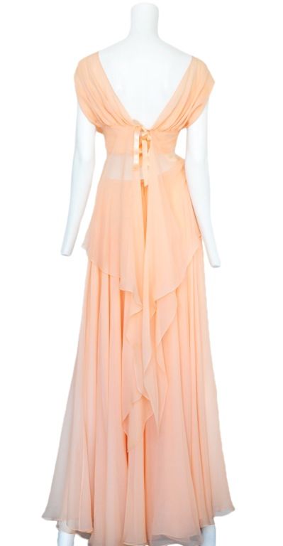 Peach layered chiffon two pieces gown with open tie back.