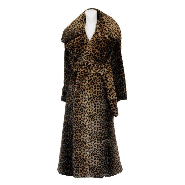 Amazing faux fur overcoat with exaggerated collar and a self waist sash in Alaia's iconic leopard print. 1990's