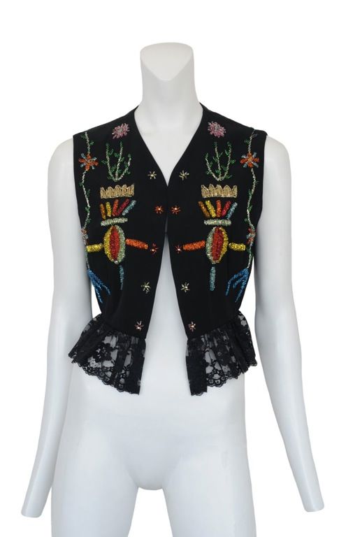 Black vest with detailed bead work in vibrant colors and  french lace trim.
