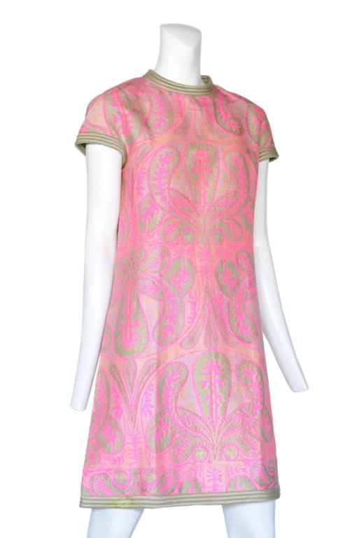 Silk Shantung paisley print mini dress with quilted chartreuse trim and cap sleeves.