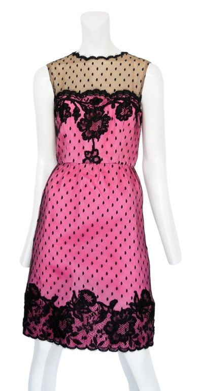 Fuchsia pink cocktail dress with french lace overlay and scallop edges. Zip back closure.
