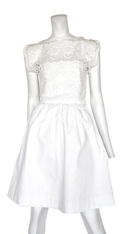 White cotton pique dress with with lace overlay, soft gathers around waistline.