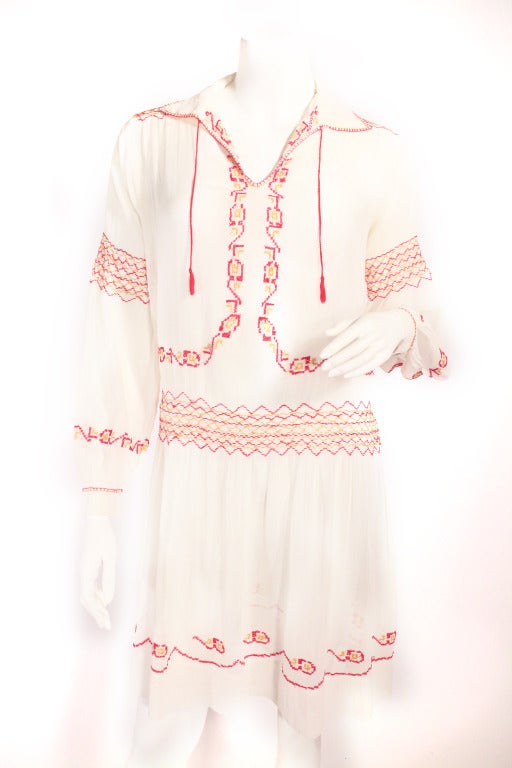 This gorgeous white, red, and yellow embroidered boho 