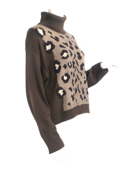 1980's Escada leopard print turtleneck sweater. Escada nails it in the army green/neutral leopard print, super trending.