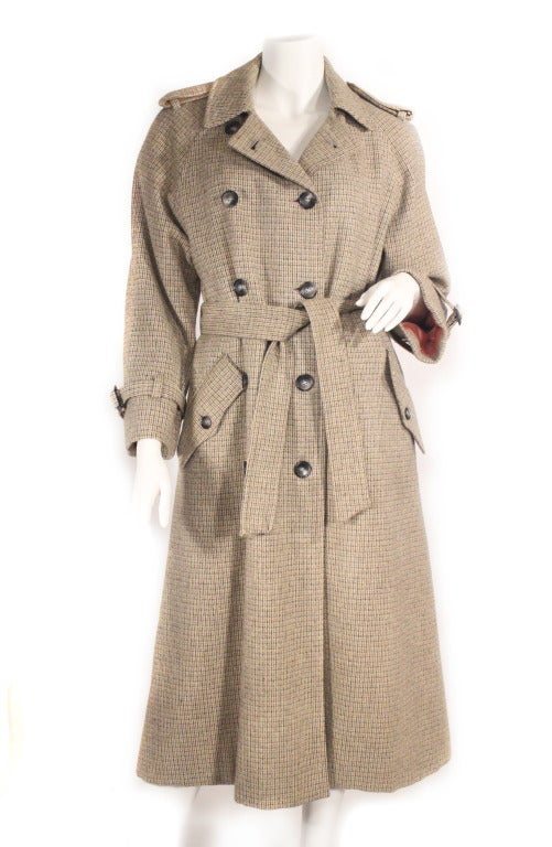 Vintage Pierre Cardin trench coat. Dating back to the late 70s early 80s. Simply a staple coat in mint condition designed by Cardin. Fully lined, elbow patches, pockets.