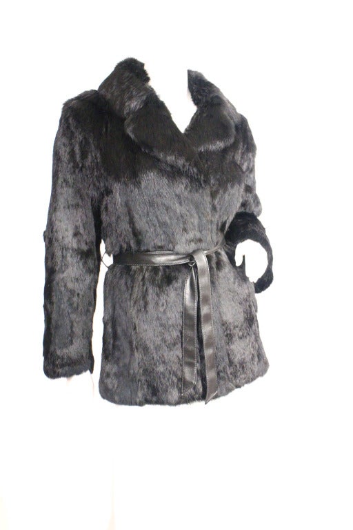 1980s black rabbit fur jacket. Fully lined, leather belt.