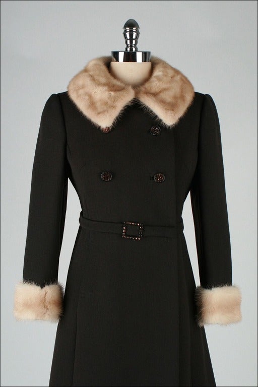 vintage 1960's coat

* chocolate brown wool
* satin lining
* mink fur trim
* rhinestone buttons and buckle
* besom pockets
* by Stegari NY

condition | excellent

fits like small

length 36