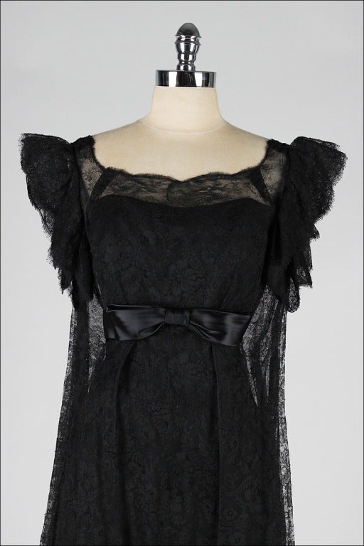 vintage 1960's dress

* black Chantilly lace
* mesh backing
* acetate lining
* satin ribbon
* bubble hem
* from Neiman Marcus
* truly one of the most beautiful 1960's dresses ever!

condition | excellent

fits like s/m

length