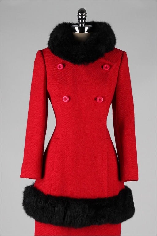 vintage 1960's coat and skirt

* red wool
* black faux fur trim
* metal side zipper skirt
* silk crepe lined jacket
* acetate lined skirt
* black faux fur trim
* besom pockets
* button front closure
* a Carlson Original

condition |
