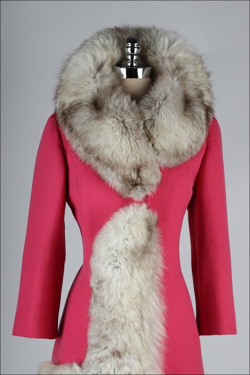 vintage 1960's coat

* medium pink wool
* fluffy fox fur trim
* hidden snap closure
* besom pockets
* acetate lining
* by Visconti

condition | excellent - few tiny holes and marks on lining

fits like small

length 32