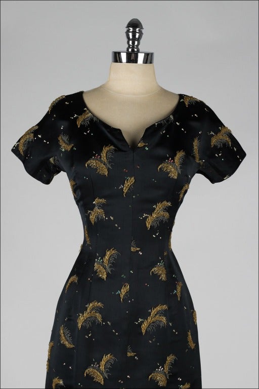 Vintage 1950's Black Satin Gold Beaded Feathers Cocktail Dress In Excellent Condition In Hudson on the Saint Croix, WI