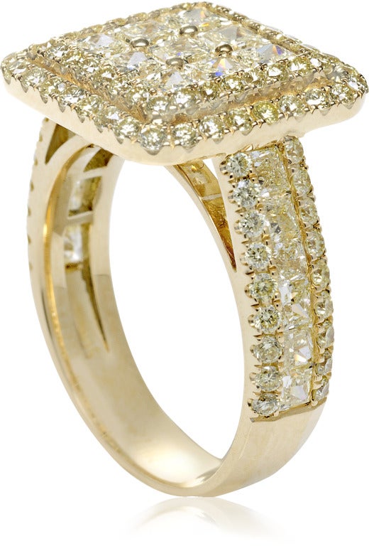 Intense yellow Round & Princess-cut diamonds, set in a simple signet ring.