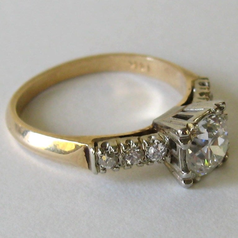 This is a wonderful Ring Circa 1930s that can be used as an engagement ring or just because.  

    acid tested 14K gold & Hallmarked as such
    Total weight is 3.2 grams of 14k gold
    Mounting in White gold, Shank in Yellow
    Cut-Old