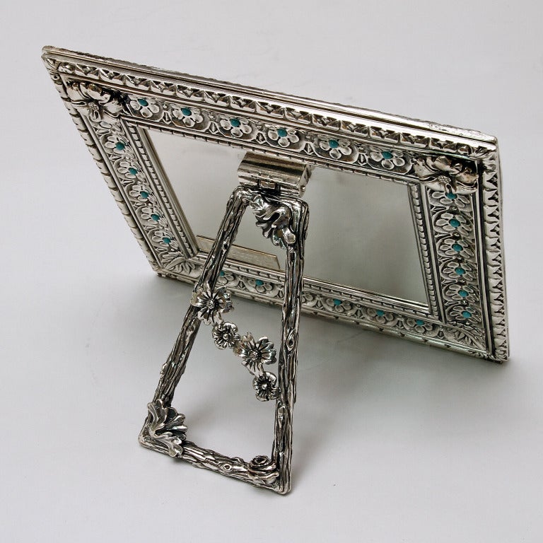 Harmony Turquoise is a limited edition picture frame   signed atelier Laura G for  Art with Heart collection .
It is a wonderful lost wax silver model hand chiselled by master craftsmen with a petit fleur design ,typical of 16th century Siena