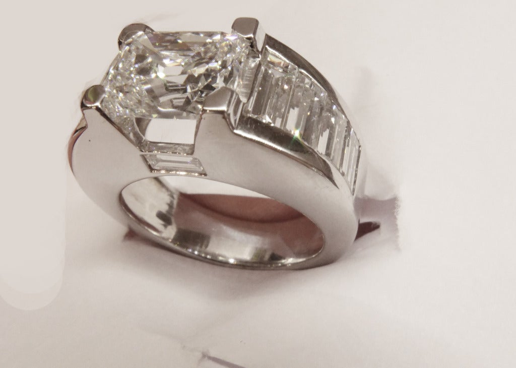Women's White gold ring set with a 2.59 carat cushion shaped diamond.
