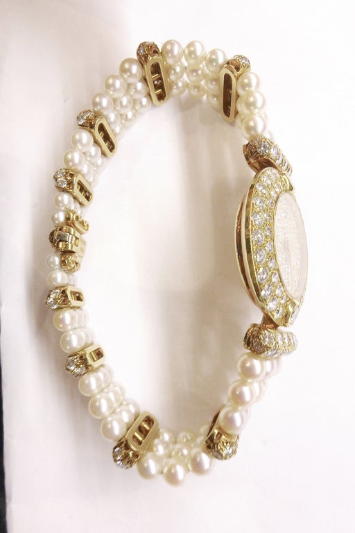 Boucheron Lady's Yellow Gold, Diamond and Pearl Bracelet Watch circa 1980s In Excellent Condition In Paris, IDF