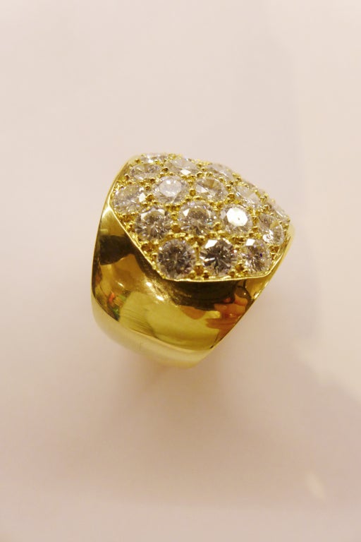 Yellow gold spectacular Rene Boivin ring set with brilliant-cut diamonds.
Ring width : 20 mm
Diamonds weight : Approximately 6 carats.
Diamonds quality : F-G/VVS
Size : 7,5