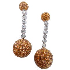 De Grisogono beads earrings, set with diamonds and orange sapphires.