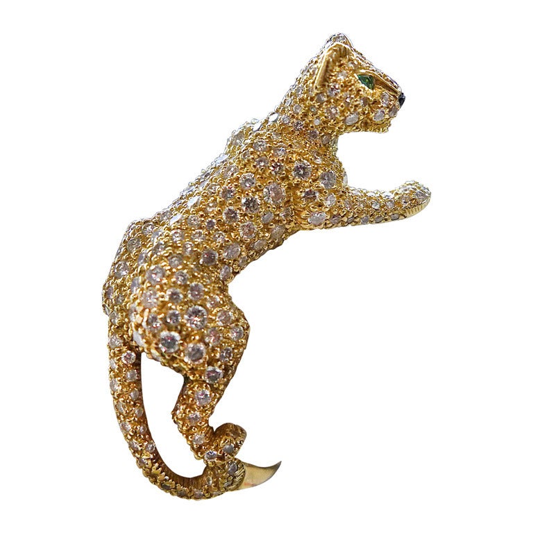 Cartier Panther yellow gold ring set with diamonds.