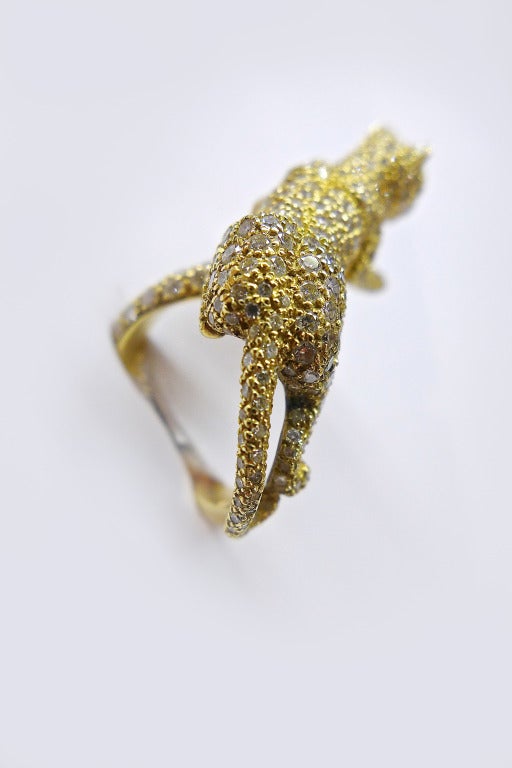 Women's Cartier Panther yellow gold ring set with diamonds.