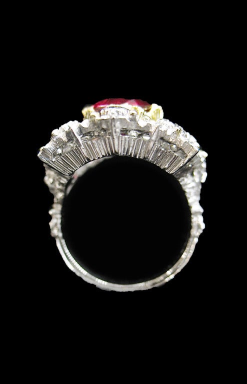 Two color of gold Buccellati ring set with a 4,02 carat oval ruby surrounding with brilliant-cut diamonds for a total weight of 1,37 carat.
Gübelin Certificat stating : Burmese with heat treatment.
Invoice from Buccellati.
Size : 5 may be sized.