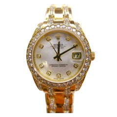 Rolex Lady
s Yellow Gold and Diamond Pearlmaster Wristwatch