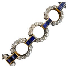 Antique silver and gold bracelet set with sapphires and old-cut diamonds.