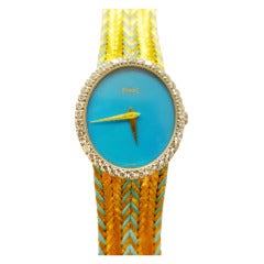 Piaget Lady's Yellow Gold and Diamond Bracelet Watch with Turquoise Dial