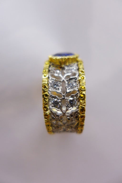 Women's Two colors of gold Buccellati ring set with a sapphire and diamonds.