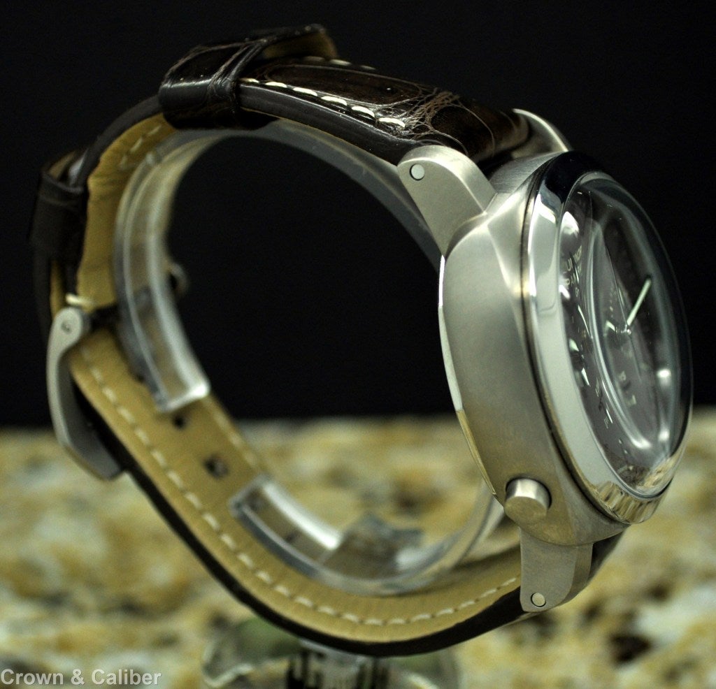Panerai Titanium PAM 311 Luminor 8 Days Chrono Monopulsante GMT
Brand: Panerai

Series: Luminor 1950 8 Days Chrono Monopulsante GMT
Model #: PAM 311
Limited Edition: XXX/300 
Dial Window: Sapphire Crystal
Dial: Brown with luminous hands &