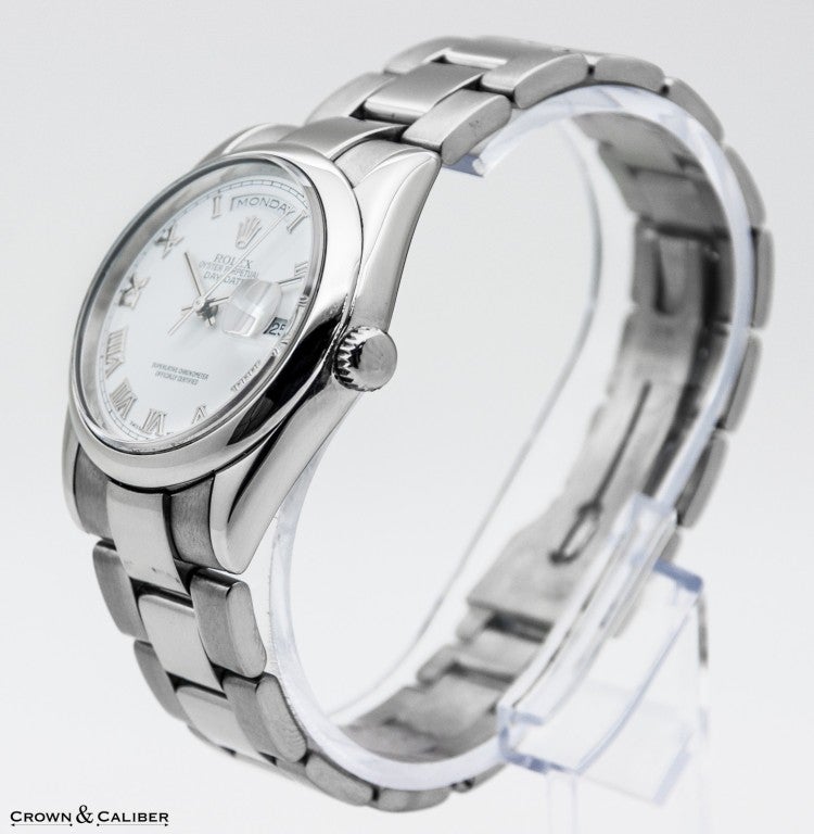 Rolex 18k White Gold Oyster Perpetual Day-Date President Wristwatch, Ref. 118209, Serial Number P, Circa 2000.

The Day-Date is the ultimate reference watch chosen by the world's elite. The very essence of luxury.
The original Day-Date was the