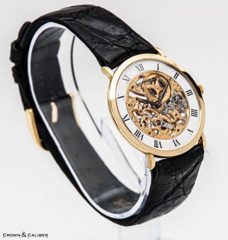 Brand: Audemars Piguet
Model Number: C56297
Serial Number: 2*****
Dial: White and 18k gold skeleton with applied black Roman numerals
Movement: Manual-Wind Mechanical
Crystal: Scratch Resistant Sapphire
Case Material: 18k Yellow Gold
Case