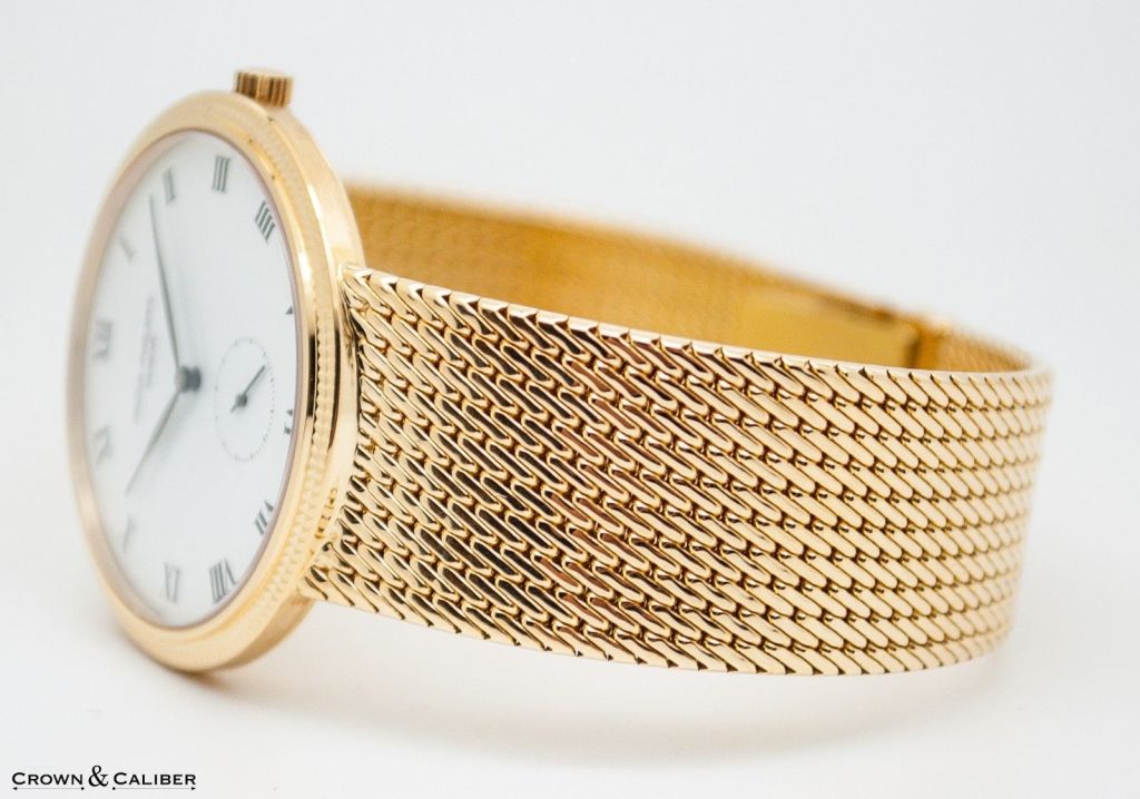 Patek Philippe Yellow Gold Calatrava Wristwatch with Integral Bracelet Ref 3919/5J In Excellent Condition In Atlanta, GA