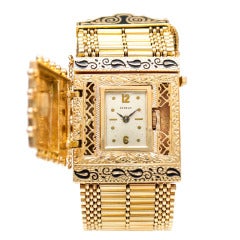 Lady
s Yellow Gold and Enemal Bracelet Watch with Concealed Dial