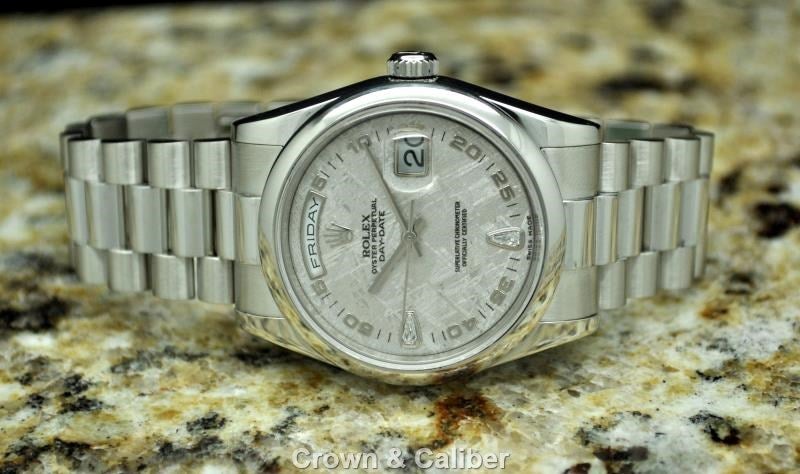 Rolex Platinum Rolex Platinum Day-Date with Meteorite Diamond Dial, Ref. 118206

Brand: Rolex
Series: President Platinum Day Date
Model #: 118206
Age: P serial, ca. 2000
Dial Window: Sapphire Crystal
Dial: Factory Meteorite Diamond