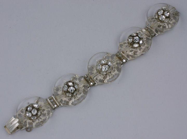Attractive Miriam Haskell link bracelet of crystal lucite rings with diamante links with pave spheres centers. USA 1960s.

Excellent condition.   

7.75