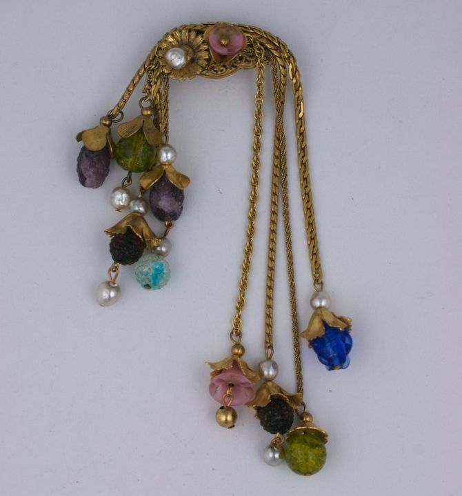 Rare Miriam Haskell double cascade brooch, of jewel tone pate de verre beads, and baroque pearls<br />
<br />
<br />
<br />
2