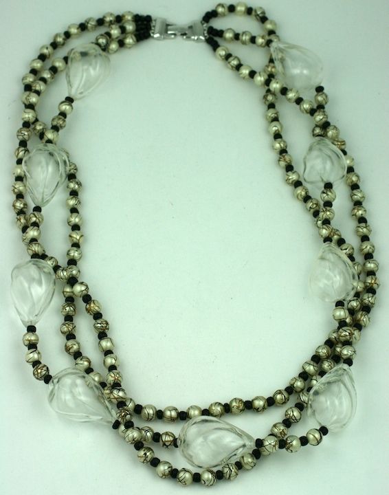 Attractive and unusual pearl bead necklace with hand splattered gold and black paint accents. Large clear blown glass pear shaped beads strung throughout. 28