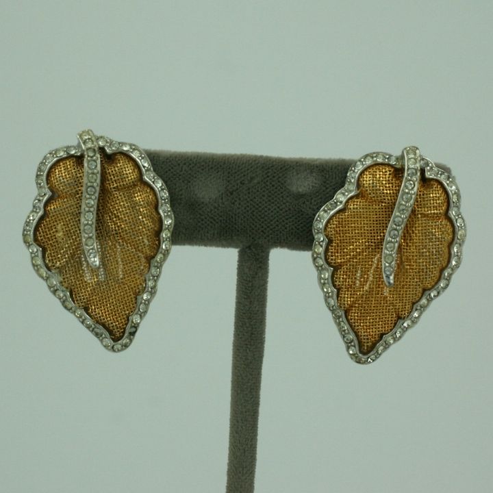 Unusual leaf earrings of gilt mesh with pave accented borders. Clip back fittings: 1.5