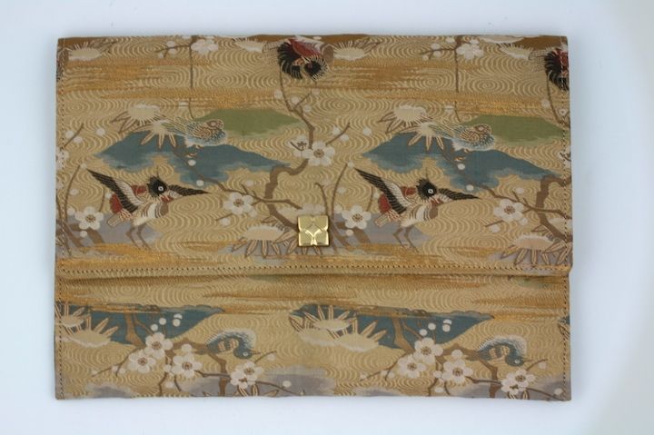 Envelope clutch of antique japanese textile remounted by Tiffany NY. Snap closure with silk faille lining. 6.5