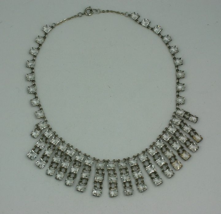Attractive art deco necklace composed of layers of prong set square crystals. USA circa 1920-30s. <br />
15